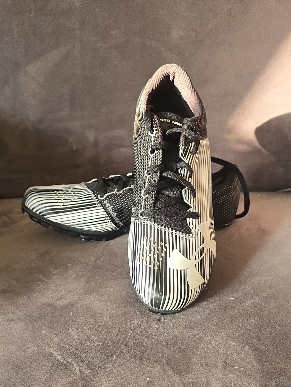 Under Armour Black & White Striped Athletic Cleats
